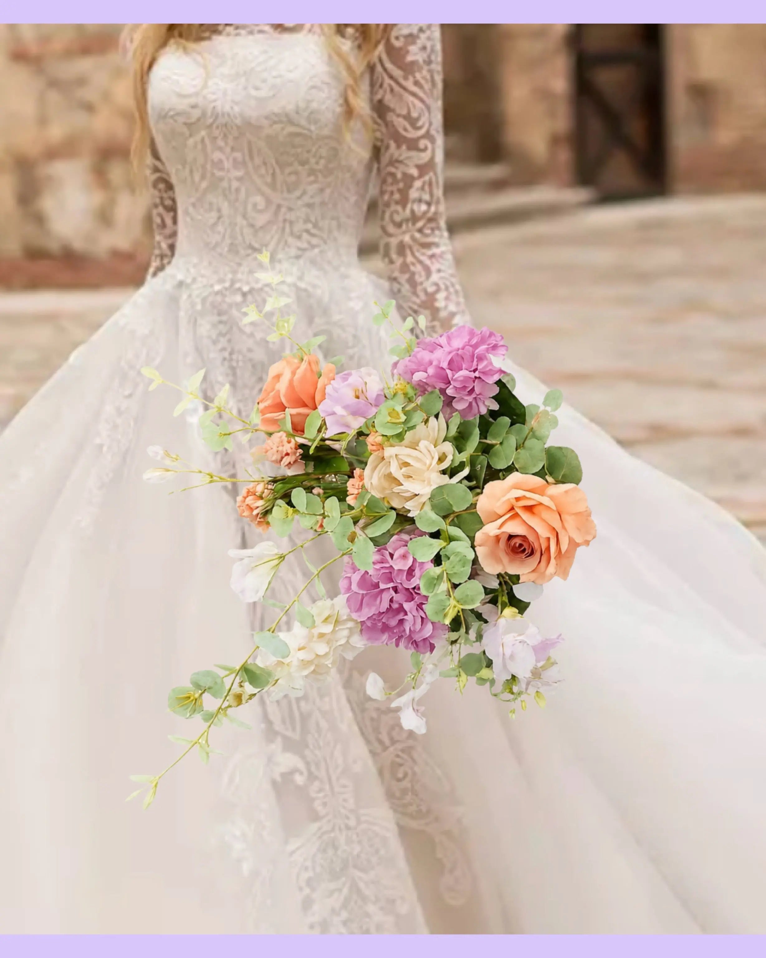 Bride holding bouquet soft peach and lilac roses and hydrangeas