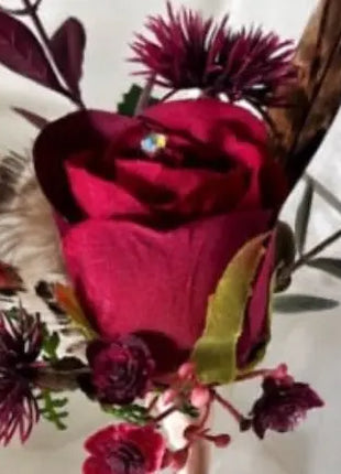 Gents, guest buttonhole, ruby red Rose with pheasant feather detail Beaux Faux Flowers Shop