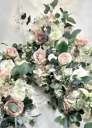 Floral wreath with pink and white flowers on a white background