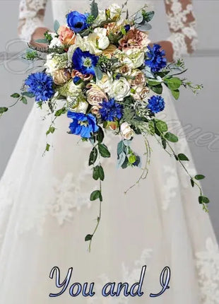 Bouquet with blue and white flowers held by a person wearing a white dress.
