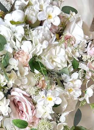 Cascading white silk flower Bridal Bouquet Close up