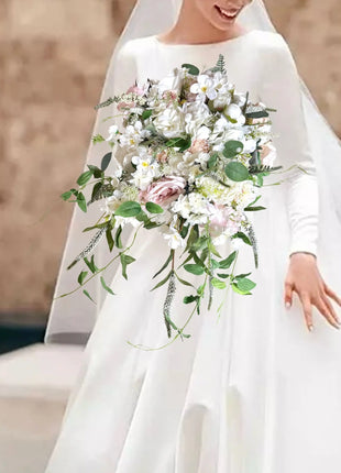 Cascading white silk flower Bridal Bouquet Held by bride