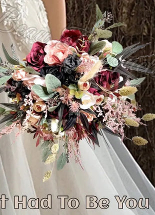Bouquet of flowers held by a person wearing a white dress, with text 'It Had To Be You' at the bottom.