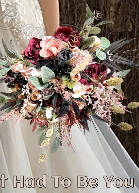 Bouquet of flowers held by a person wearing a white dress, with text 'It Had To Be You' at the bottom.