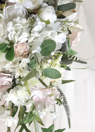 Cascading white silk flower Bridal Bouquet close up