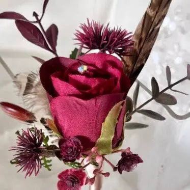 Gents, guest buttonhole, ruby red Rose with pheasant feather detail Beaux Faux Flowers Shop