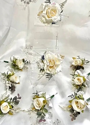 Decorative floral arrangements on a white fabric background
