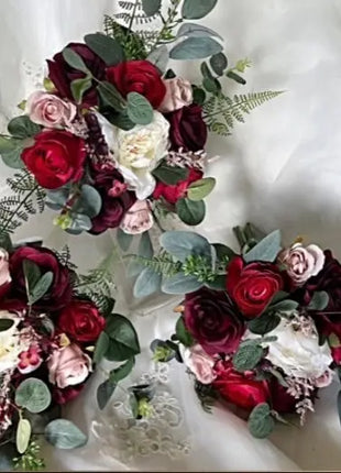 Three floral bouquets with red, pink, and white flowers on a white background