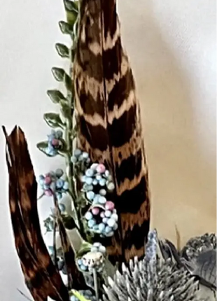 Gents, guest buttonhole with Dusty blue eryngium thistle and pheasant feather detail Beaux Faux Flowers Shop