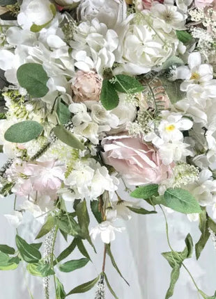 Cascading white silk flower Bridal Bouquet close up