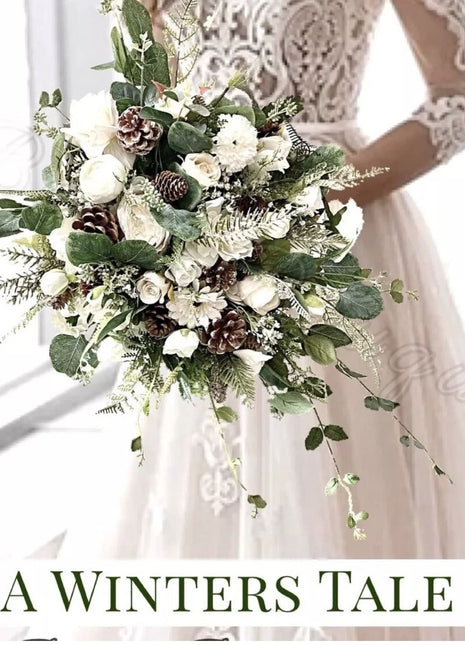 Wintry white bridal bouquet in white, Ivory, cream with fir cones