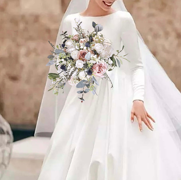 Bride holding a bouquet with a blurred background