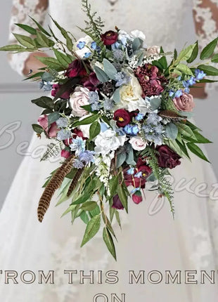 Scottish bridal bouquet with roses pheasant feather,  blue, red, Ivory blush  image 0